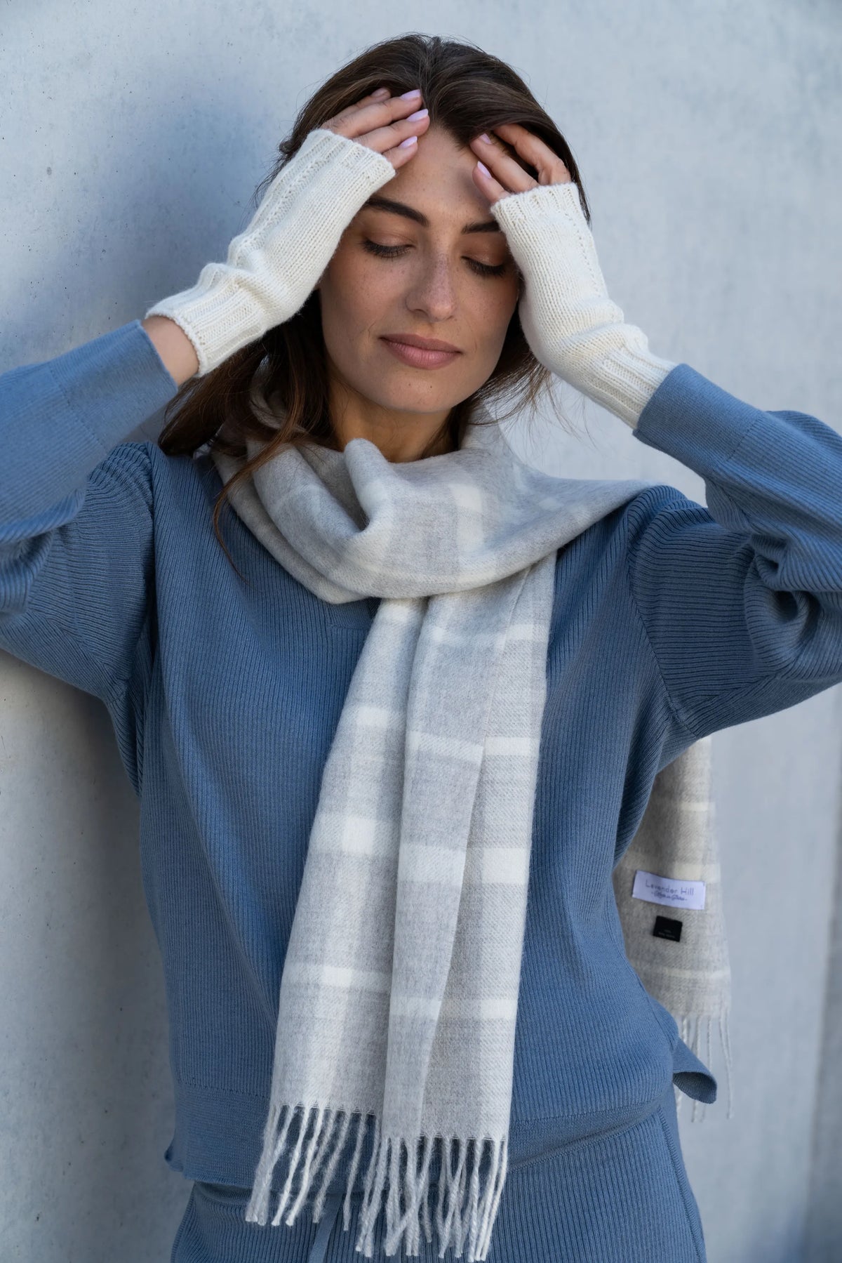 The Alpaca Scarf & Wristwarmer Gift: plaid alpaca scarf and wristwarmers worn