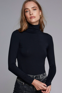 Women's long sleeve roll neck top by sustainable clothing brand Lavender Hill Clothing